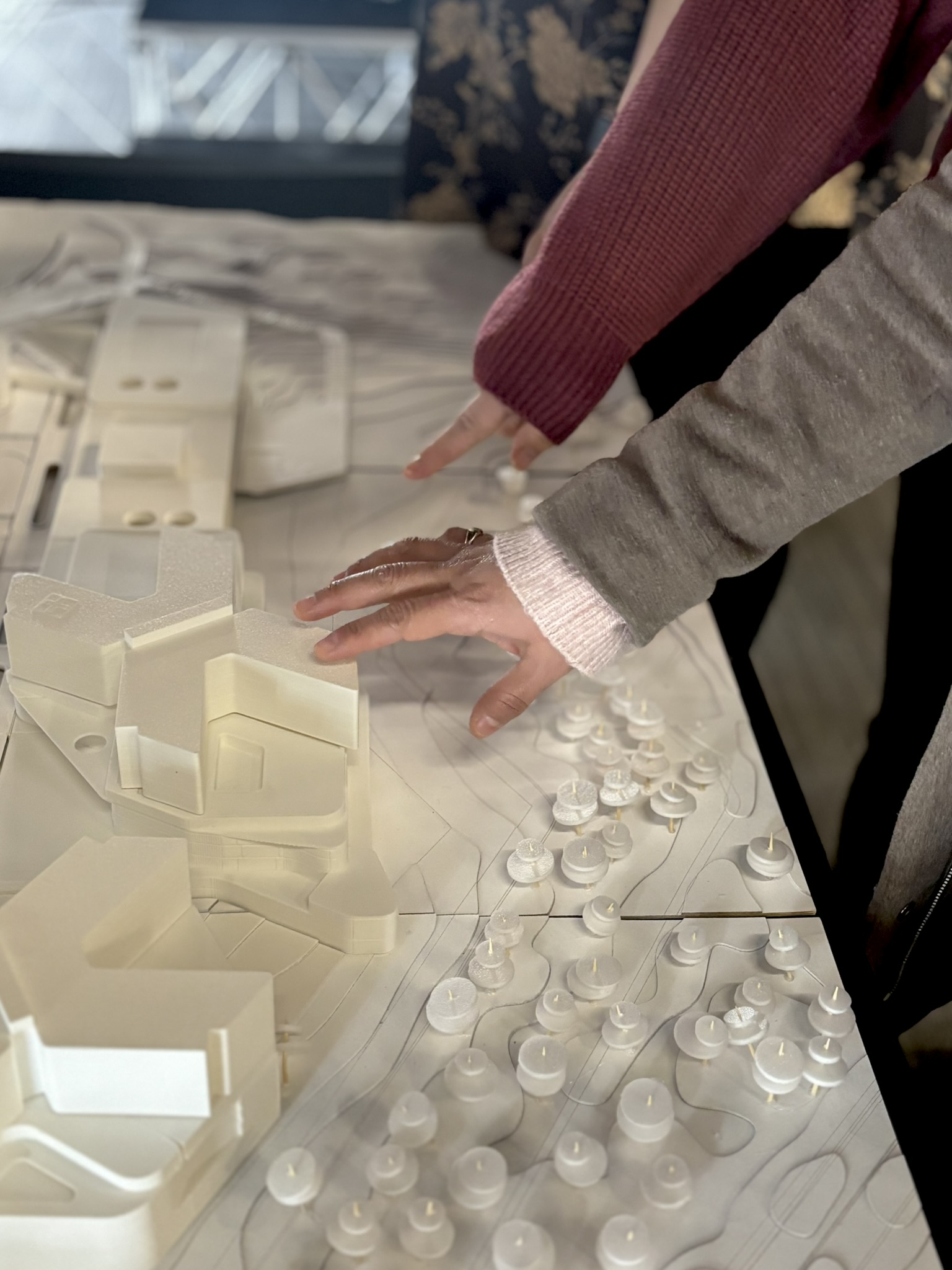 People building a model of Waterloo Region’s new hospital.