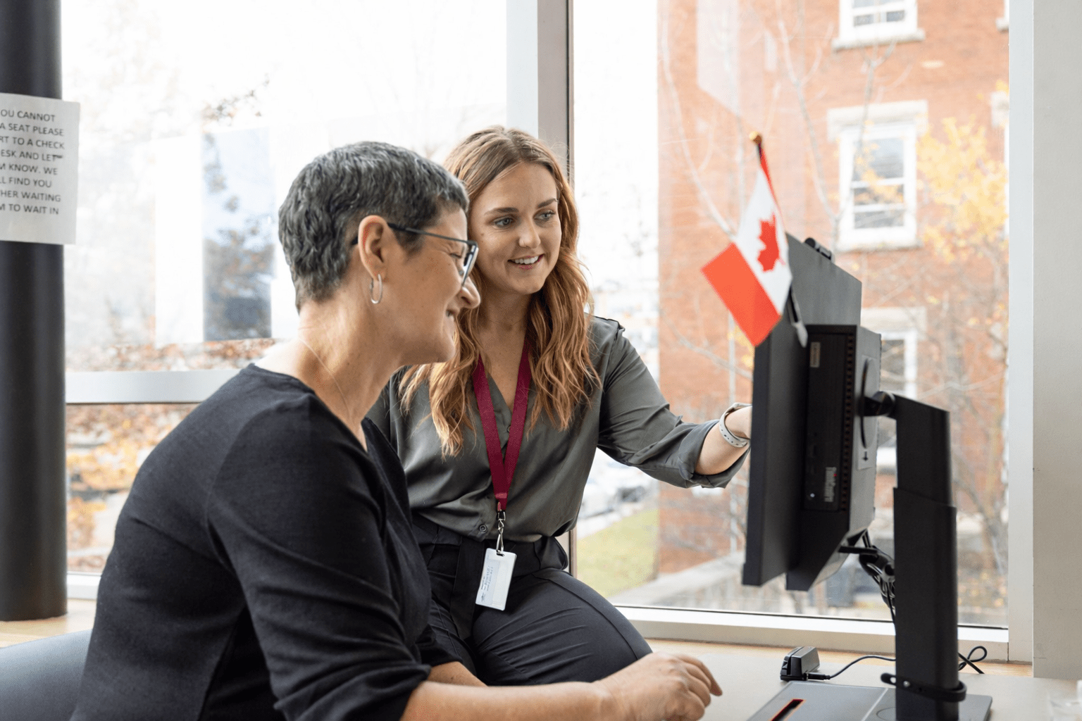Two Waterloo Regional Health Network professionals at the desk